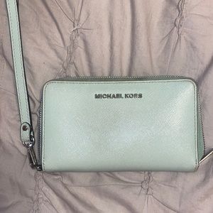 Teal Micheal Kora wallet